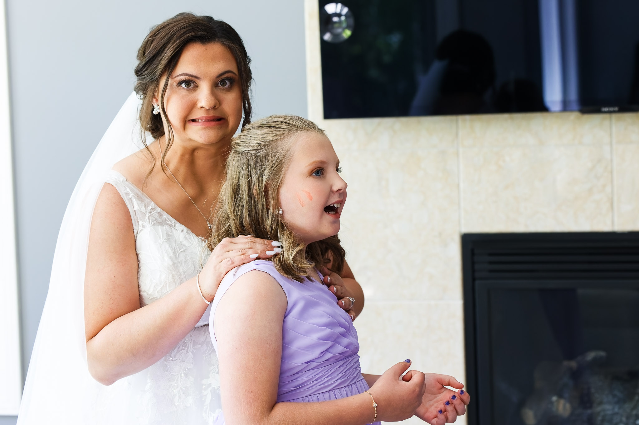 Bride Leaves Lipstick Mark on Daughter During Wedding Portraits