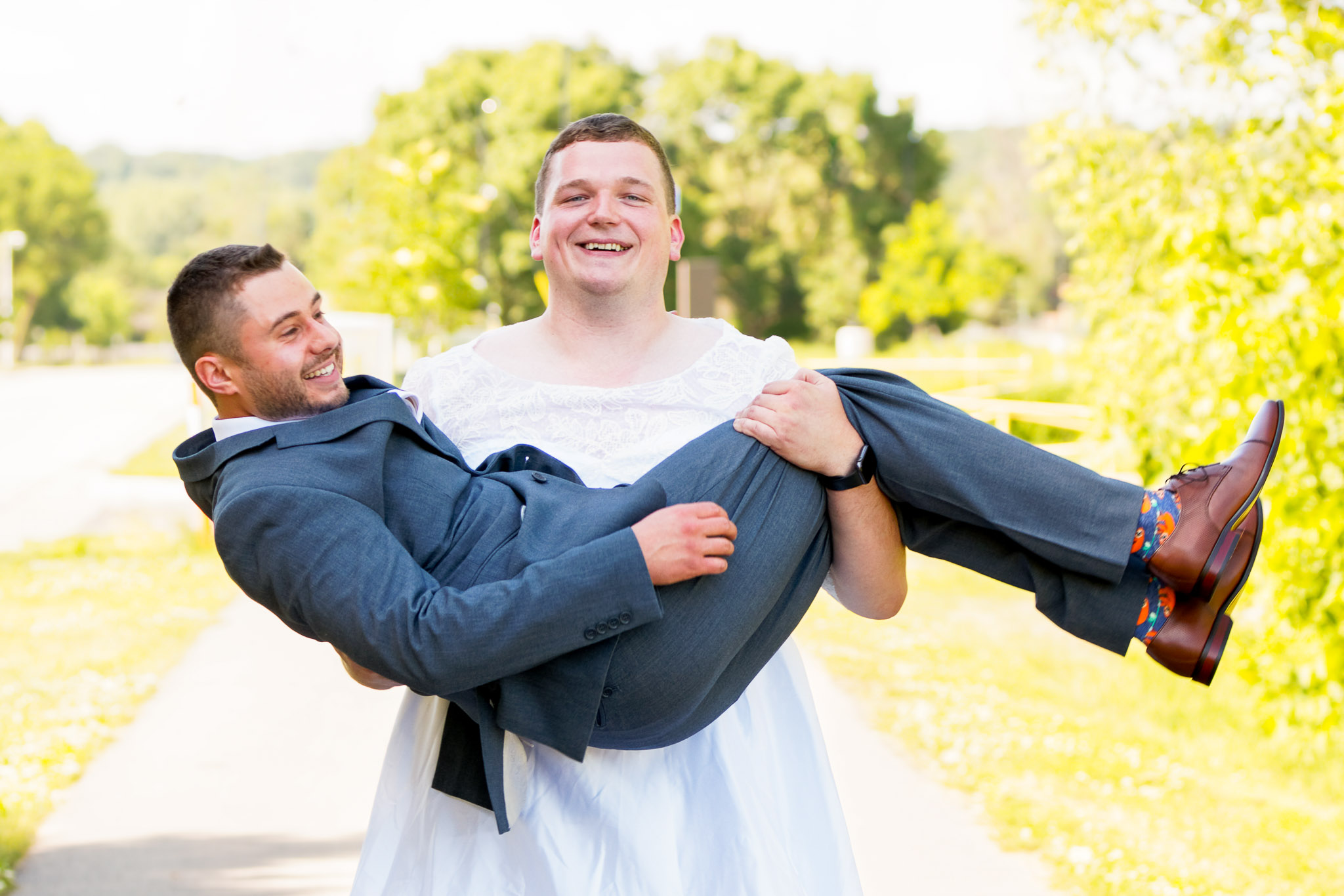 Best Man Carries Groom While Wearing Wedding Dress - Funny Photo