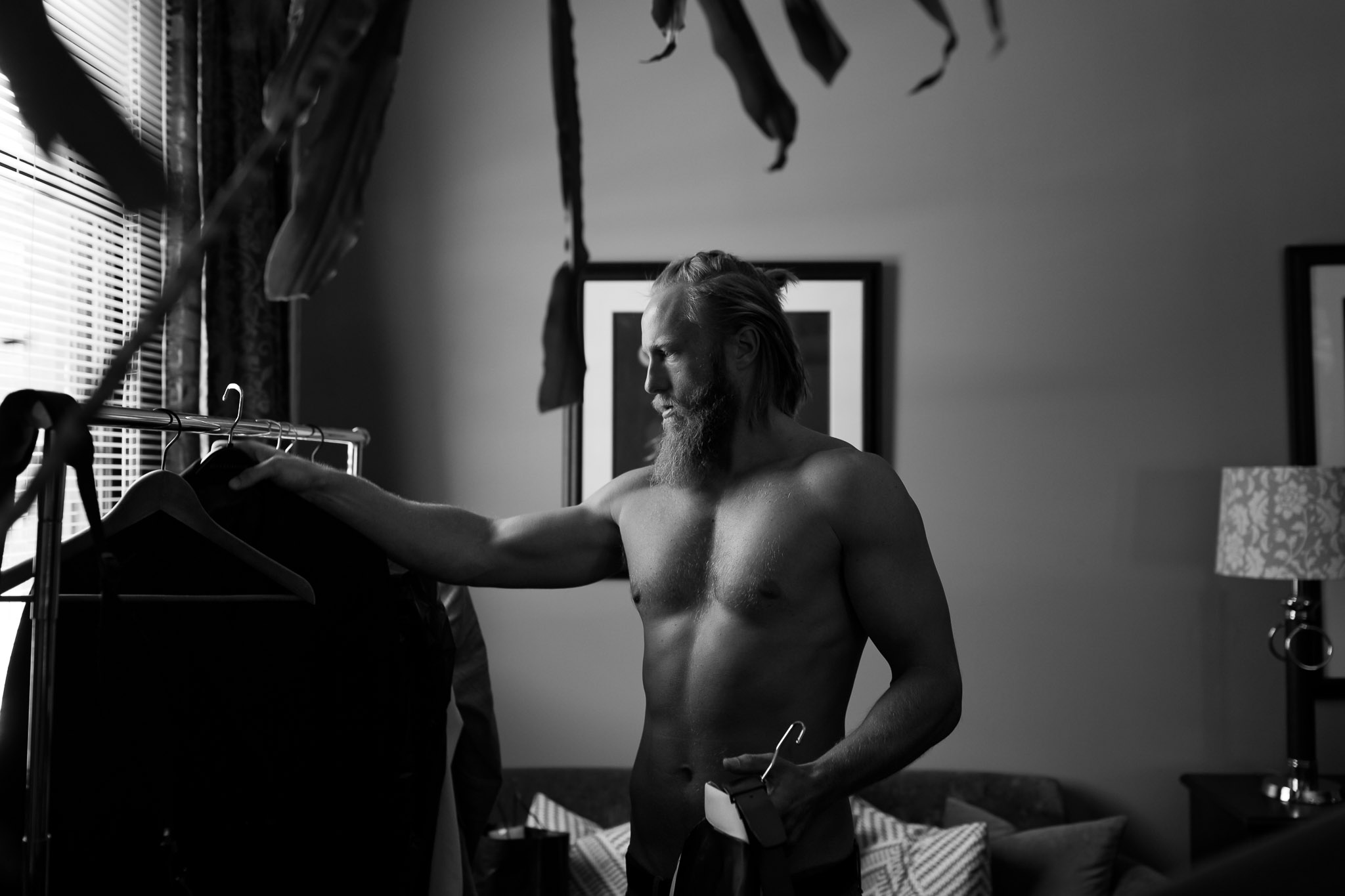 Groom Choosing Wedding Suit - Morning Preparations Minneapolis