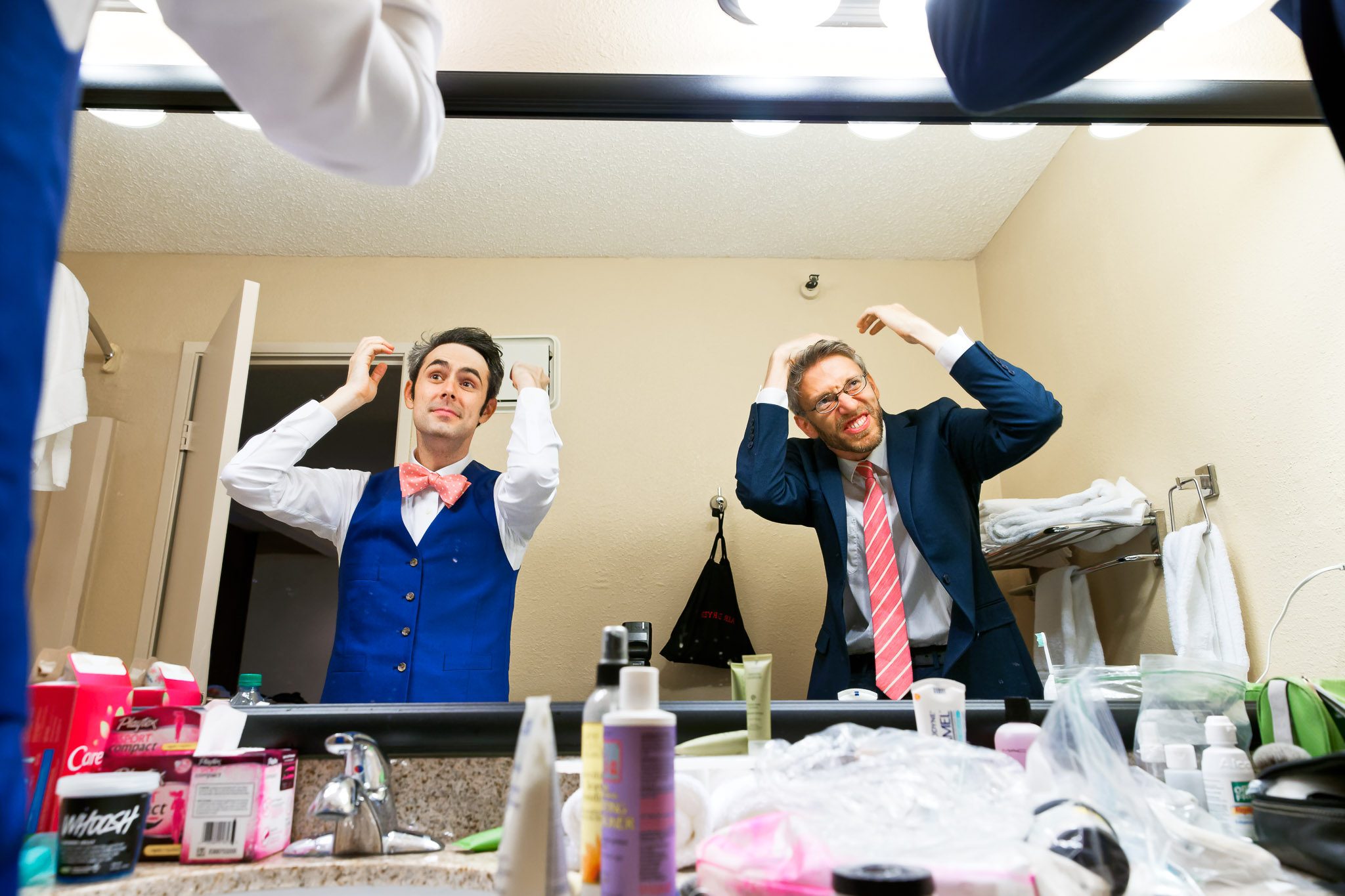 Groom's Last Minute Hair Styling in Hotel Bathroom