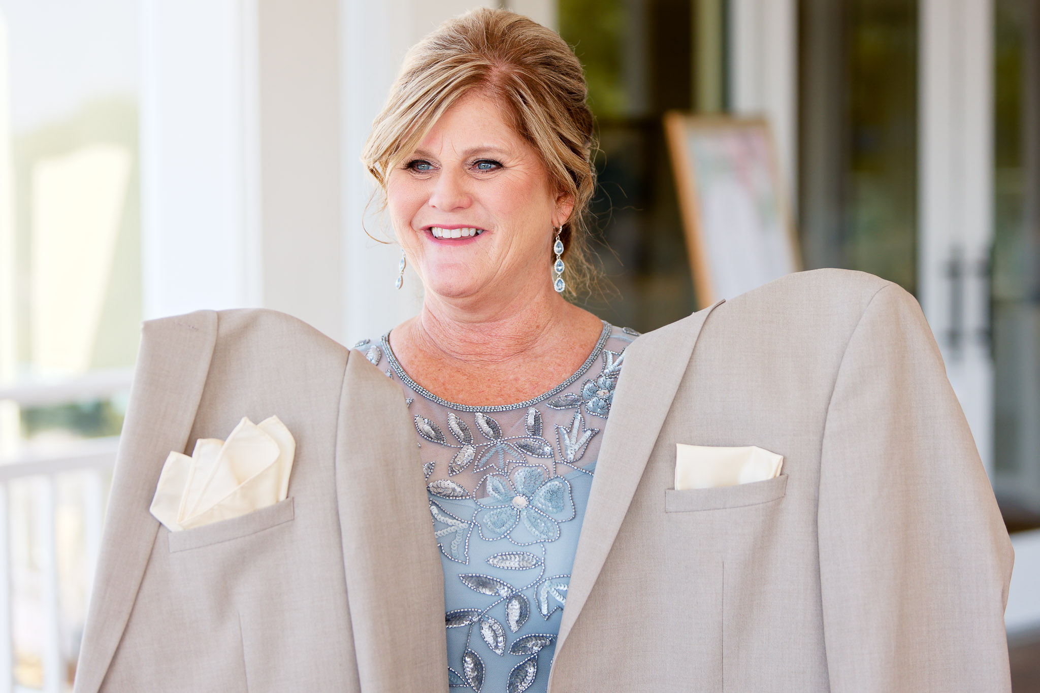 Mother Helps Choose Pocket Squares During Groom Prep