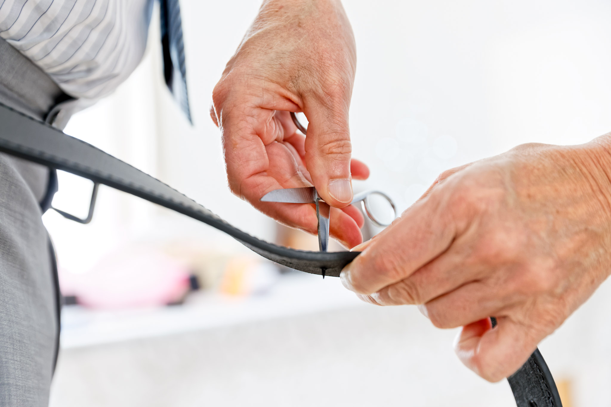 Groom Belt Adjustment Detail - Wedding Morning Preparation
