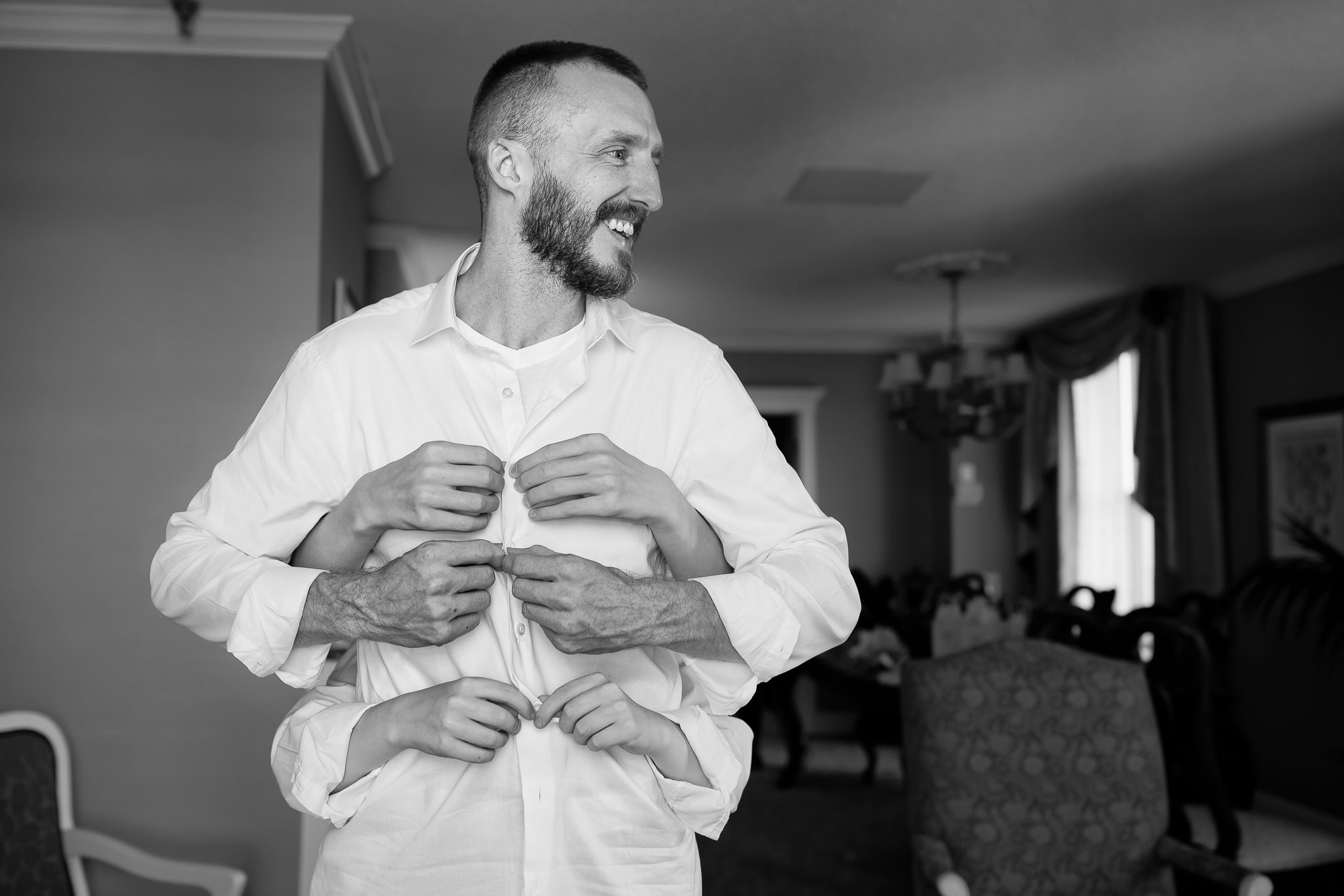 Groom Getting Help From Kids During Wedding Preparation