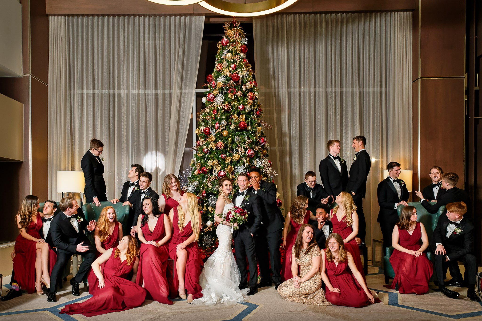 Christmas Wedding Party Group Photo in Hotel Lobby