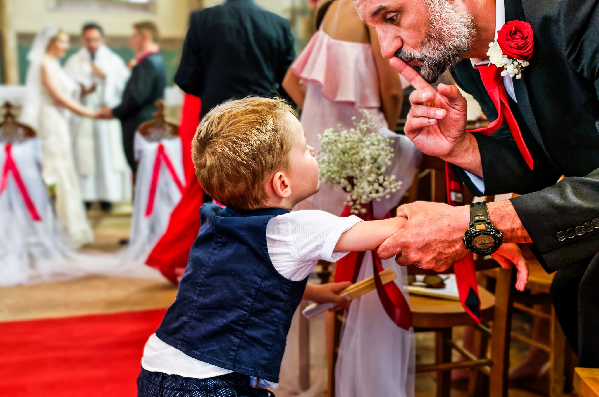 Ring Bearer Delivers Flowers During Church Wedding Ceremony