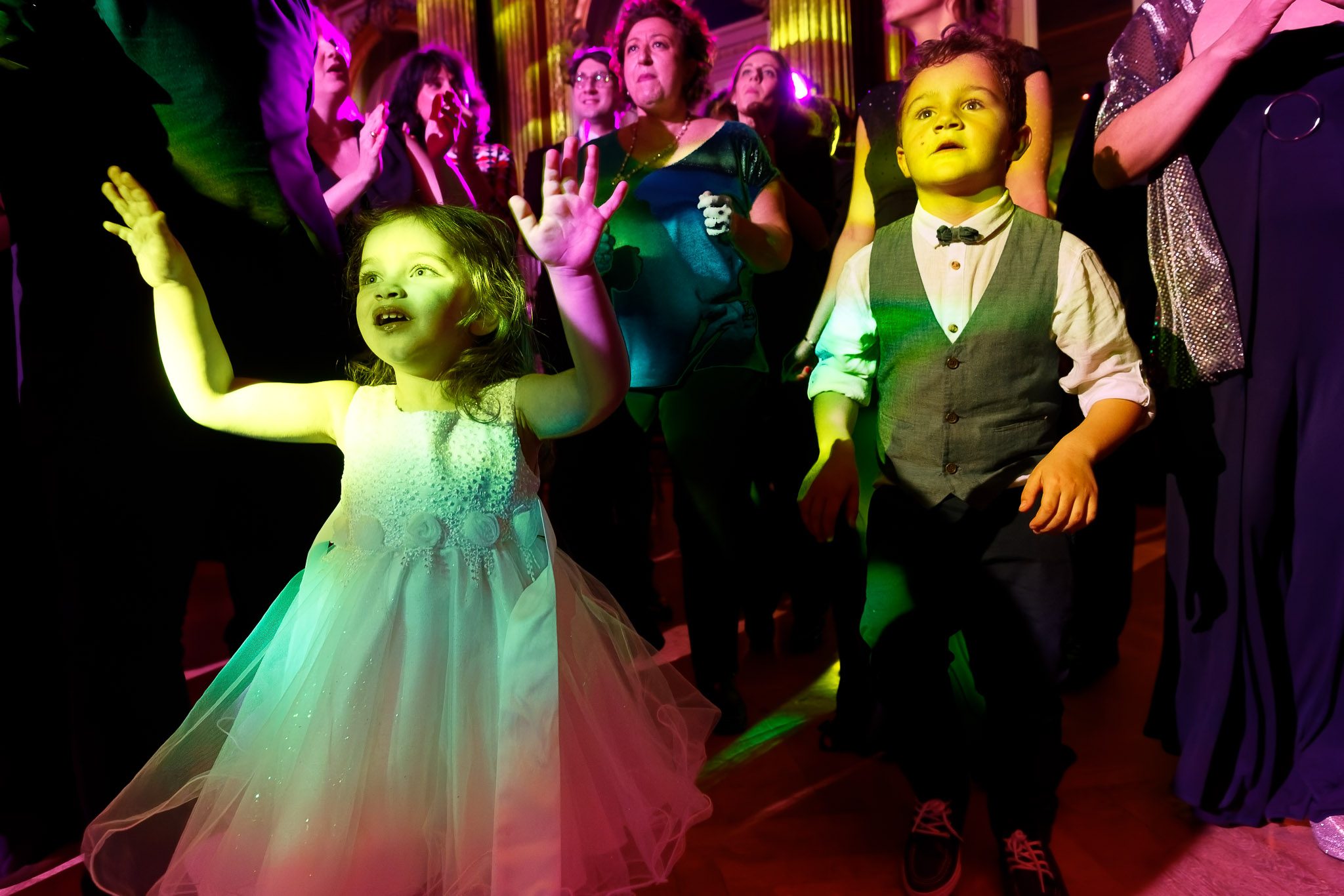 Children Dancing in Colorful Wedding Reception Light Show