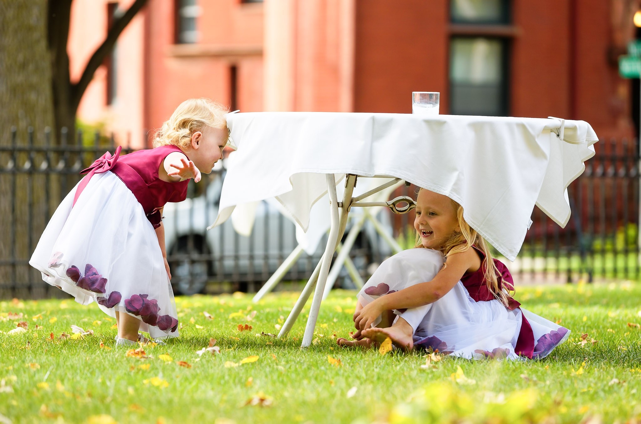 Flower Girls Playing During Wedding Cocktail Hour