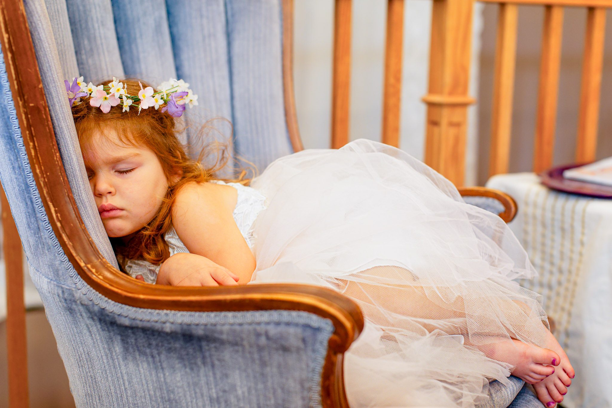 Flower Girl Sleeping During Wedding Preparations Minnesota