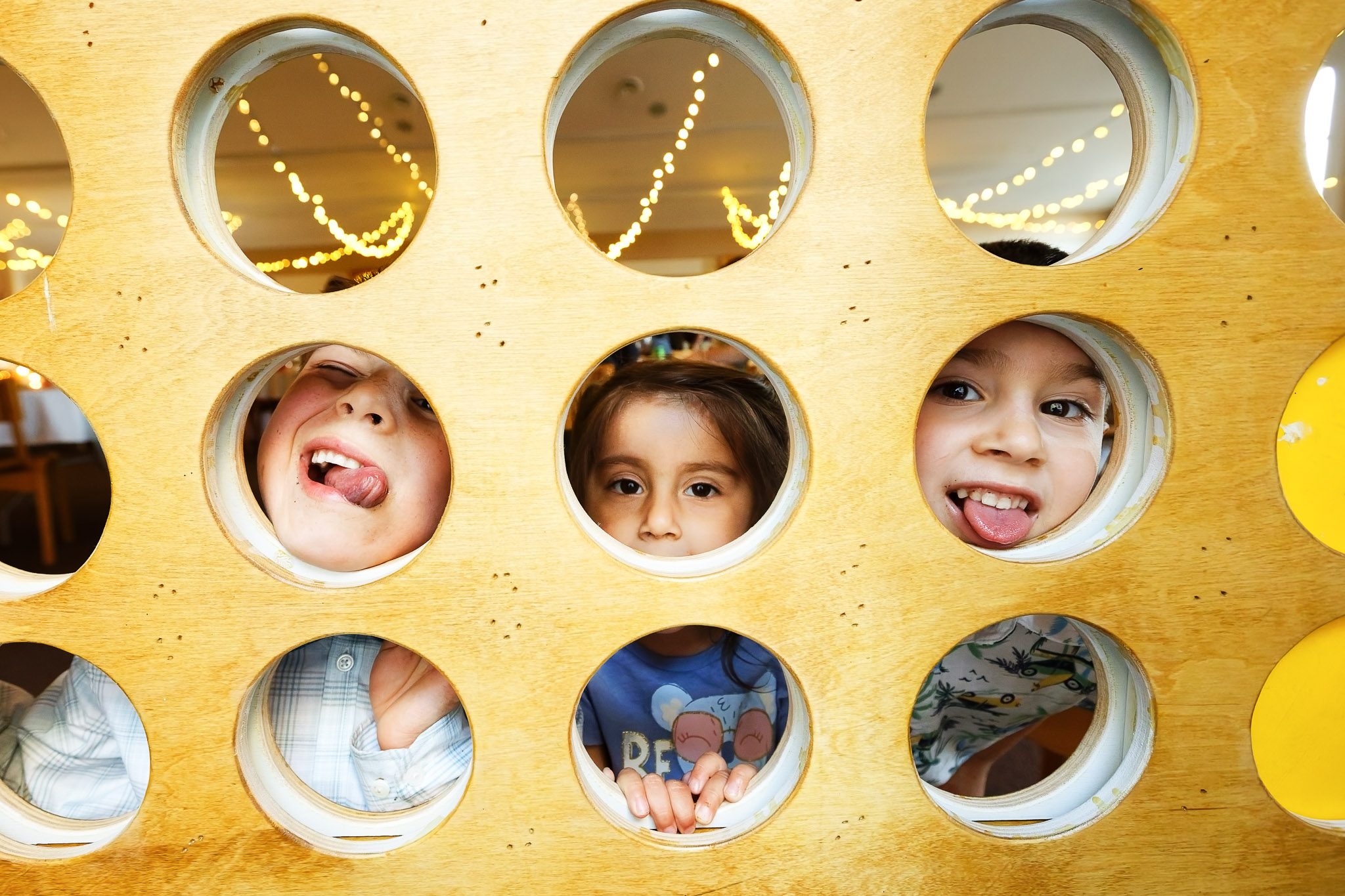 Kids Playing Giant Connect Four at Minnesota Church Wedding