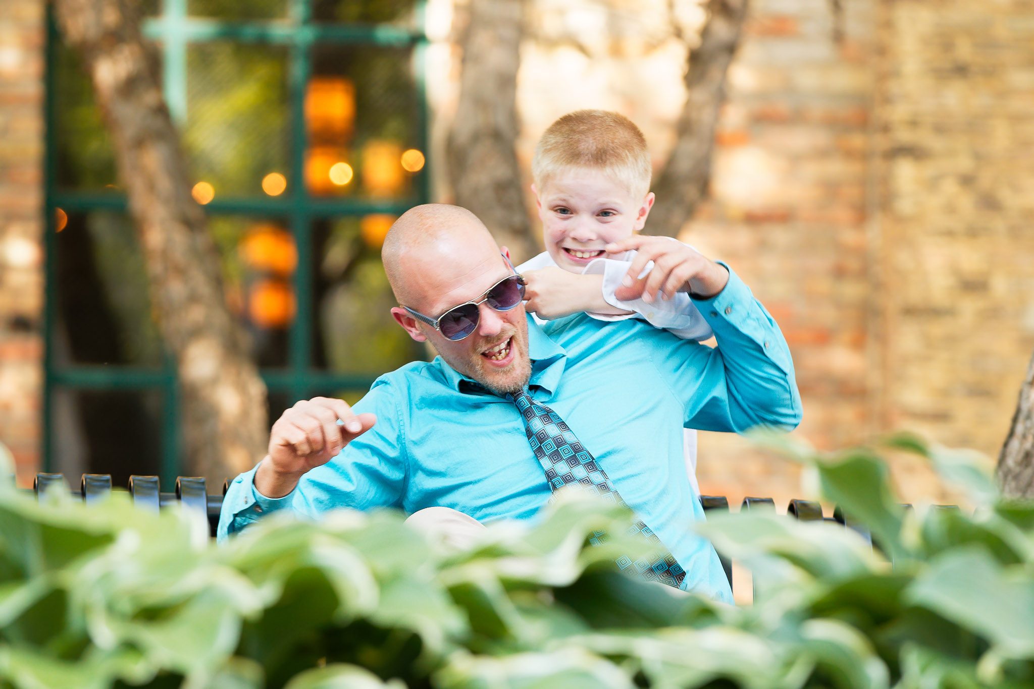 Father and Child Playing at Minneapolis Wedding Reception