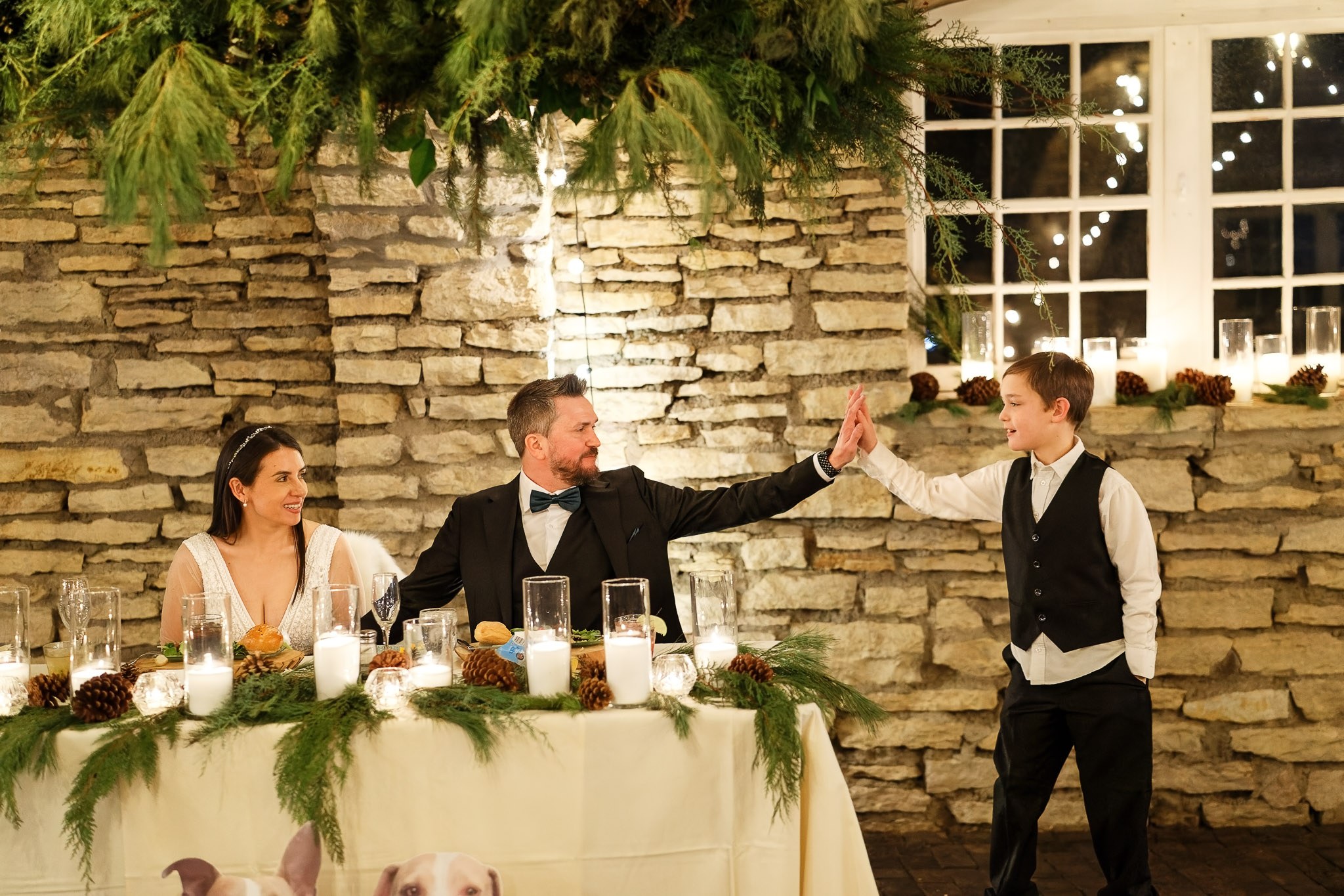 Wedding Server High Five with Groom at Stone Barn Reception