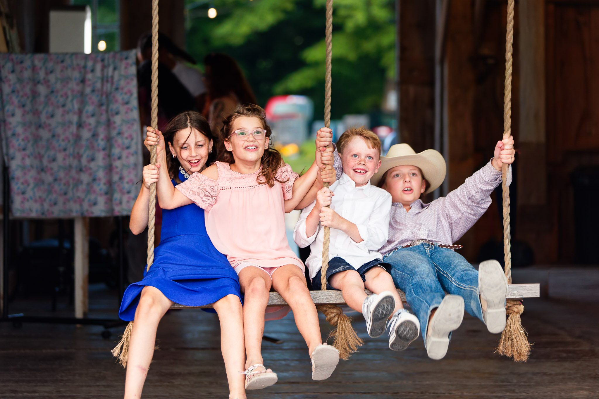Kids on Swing at Maple Ridge Farm Wedding Reception