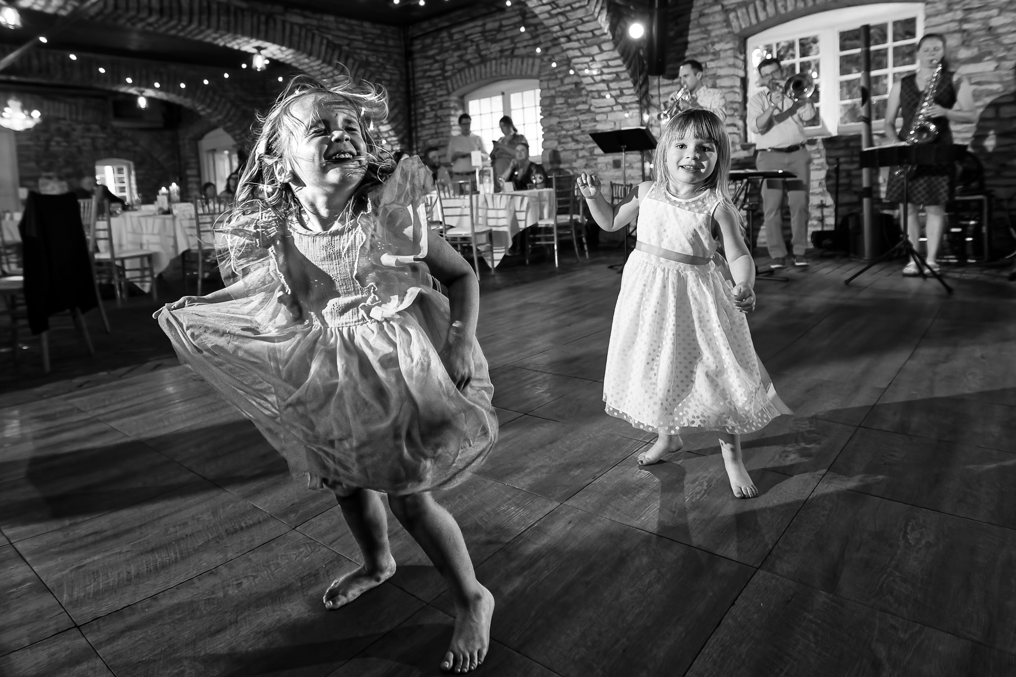 Girl Dancing Wild at Mayowood Stone Barn Wedding Reception
