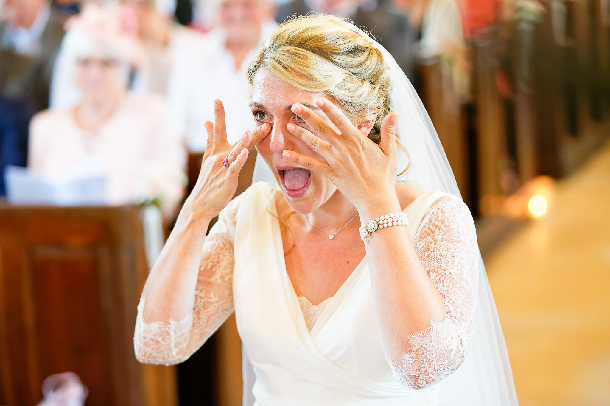 Bride Wiping Tears During Emotional Church Wedding Ceremony