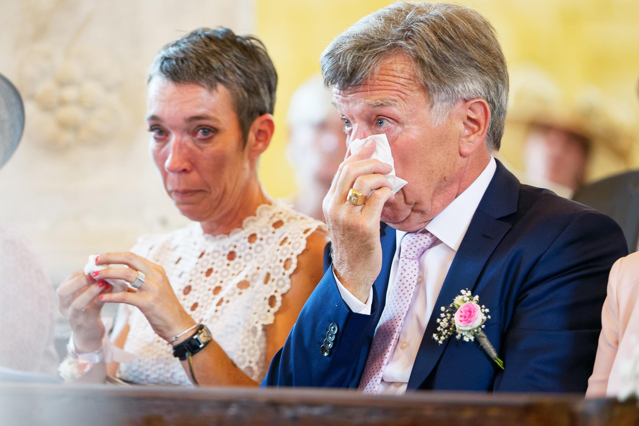 Emotional Father and Sister Crying During Church Wedding