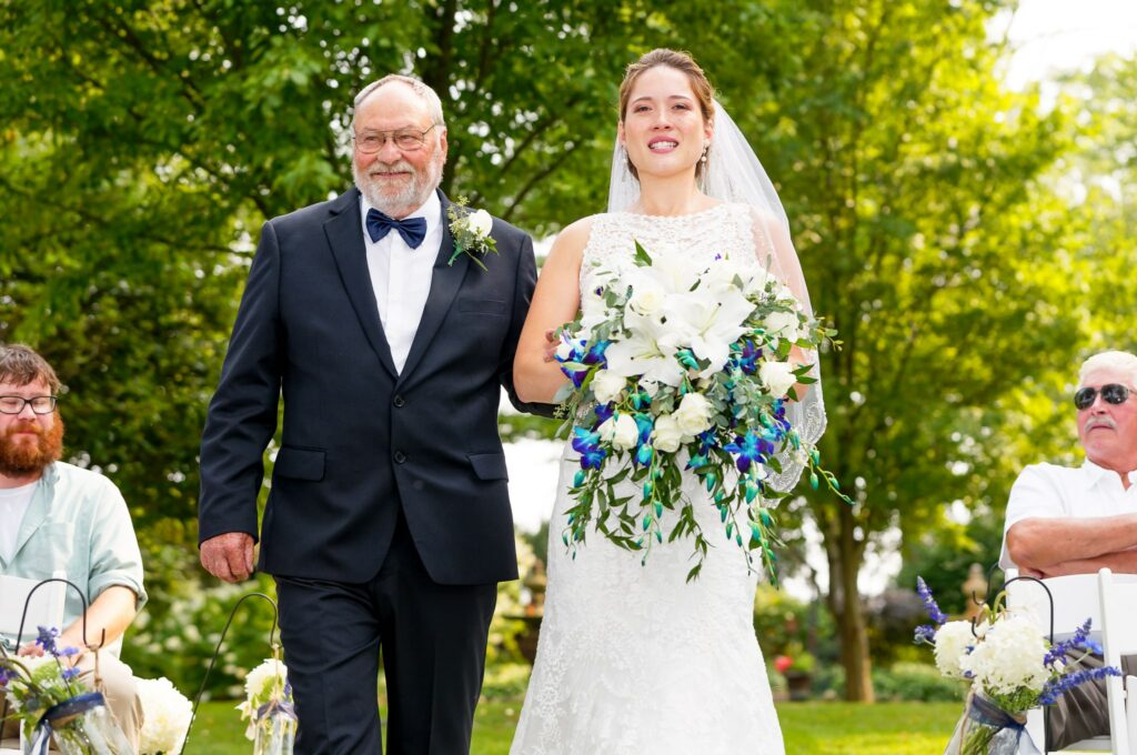 Bride Crying Walking Down Aisle with Father Wedding Photo