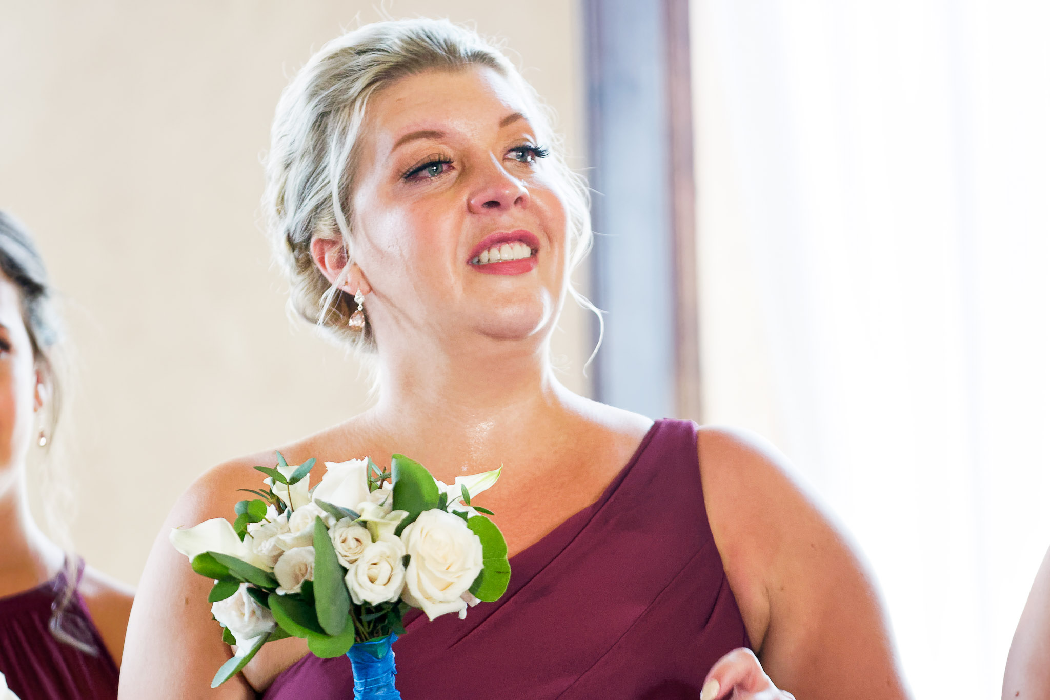 Emotional Bridesmaid Crying During Wedding Ceremony