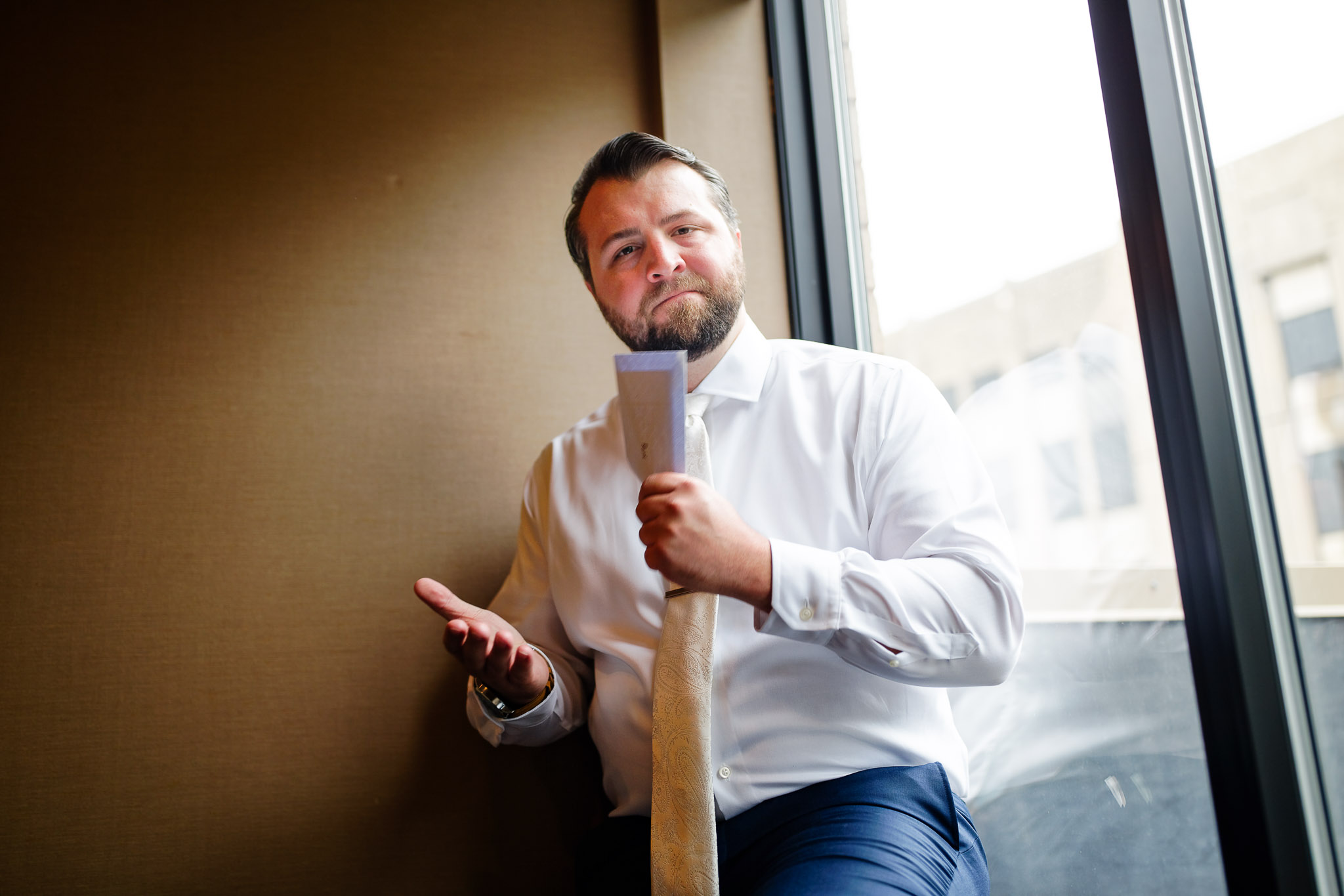 Groom Reading Bride's Letter Before Wedding Ceremony