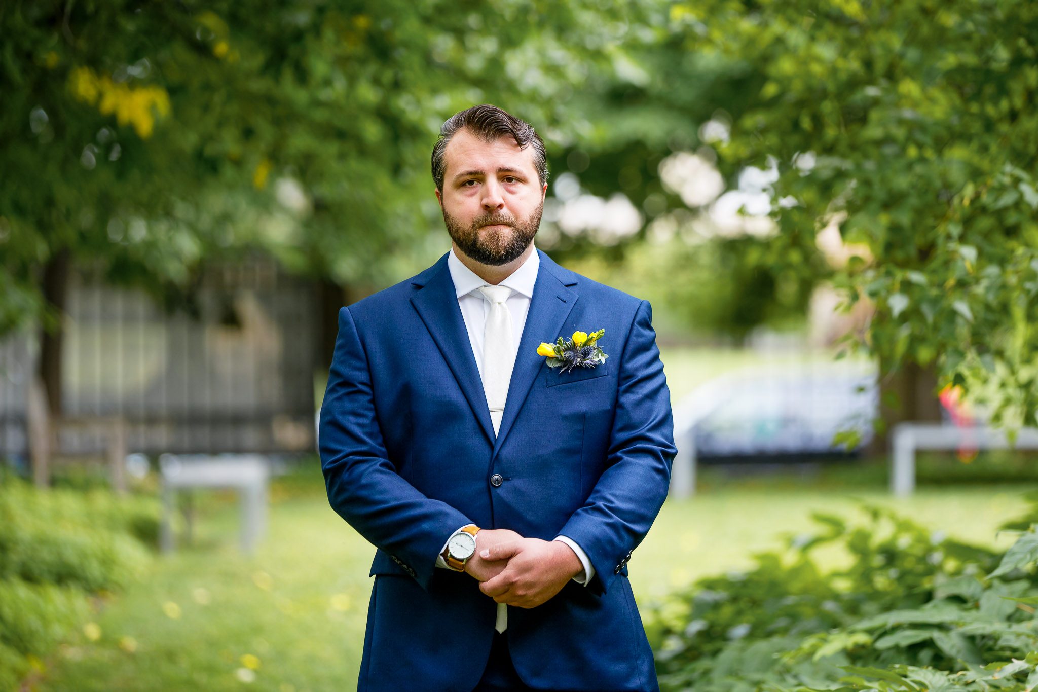 Nervous Groom Waiting for Bride at Outdoor Wedding Ceremony