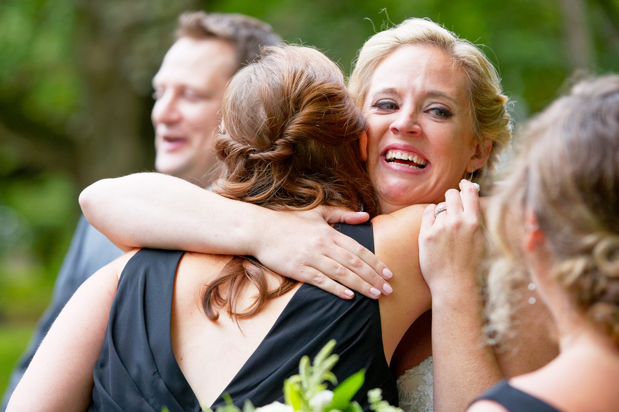Bride and Guest Crying After Wedding Ceremony
