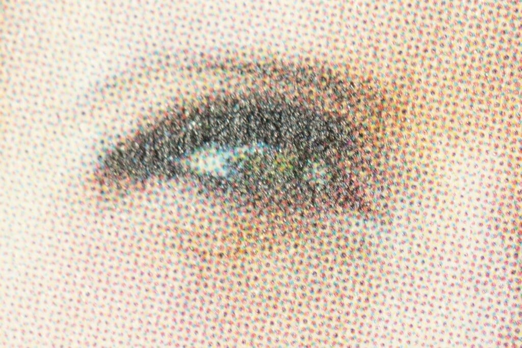 offset printing details closeup of an eye
